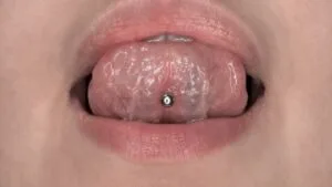 center oral piercing under the tongue 