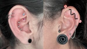 ear piercings with industrial, helix, tragus and lobe style 