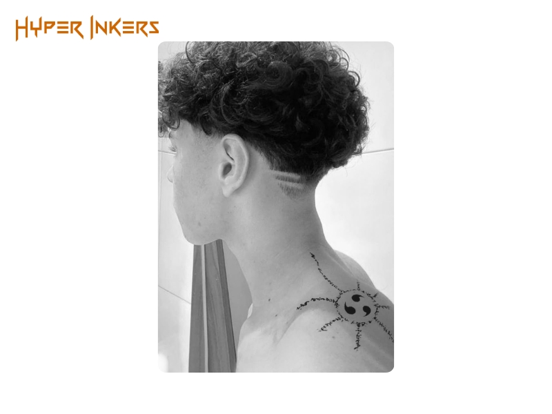 spine tattoo placement - Hyper Inkers A powerful pop culture symbol, perfectly placed on the upper back for a modern and meaningful statement.