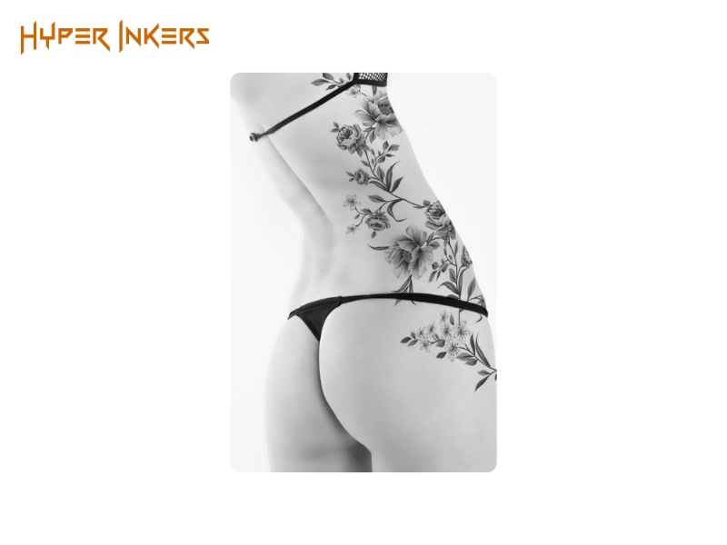 An elegant floral piece designed to flow with and accentuate the body's natural lines.
